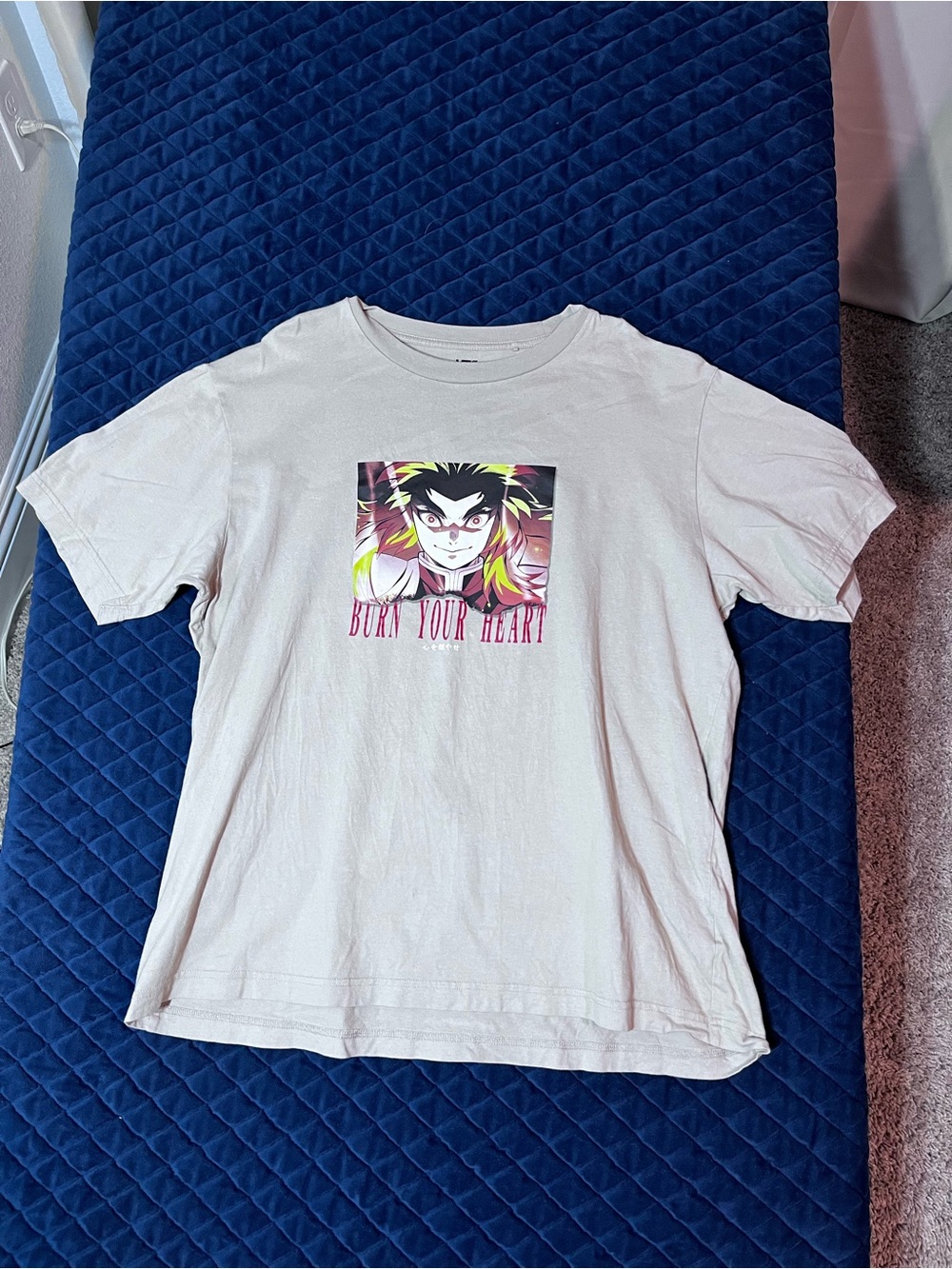 Uniqlo White Anime Graphic Tee with Multicolor Print - Burn Your Heart - Casual
